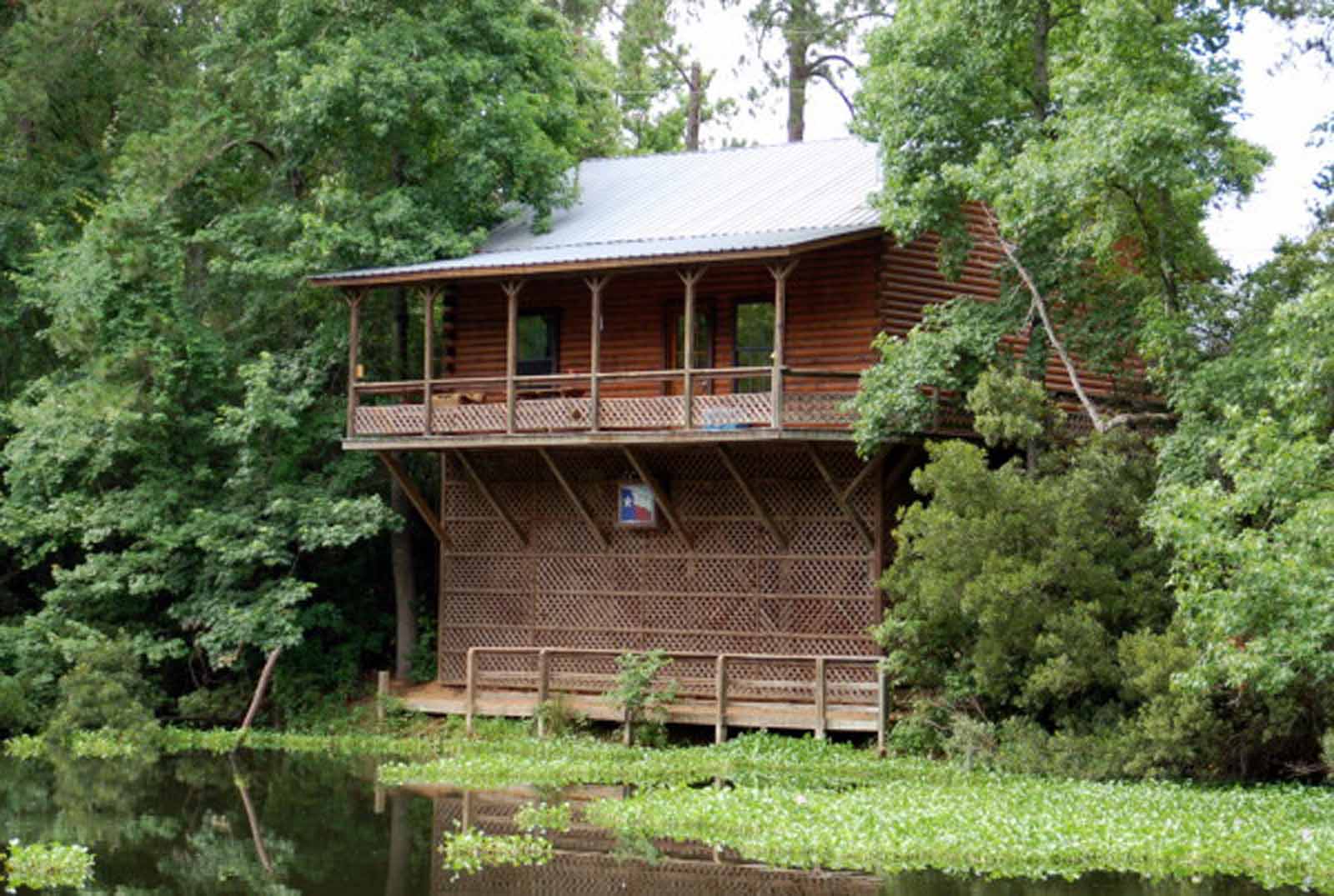 2 Bedroom with Loft Log Cabin  The Retreat at Artesian Lakes